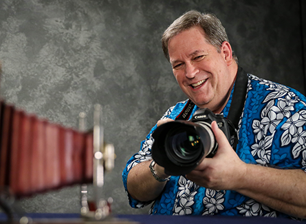 Image of Terry Smemo holding a camera