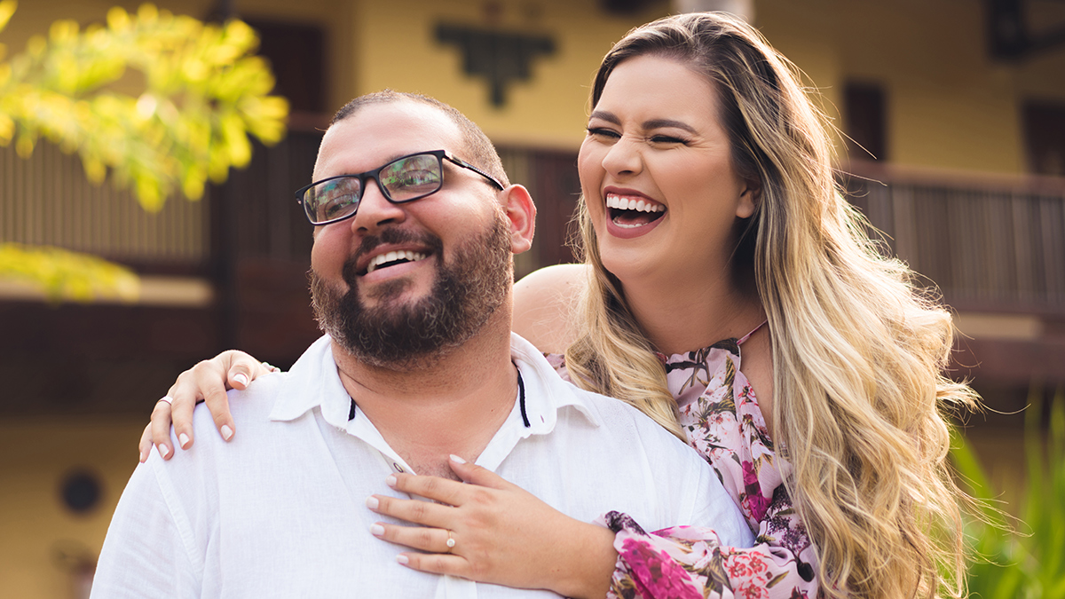Laughing plus size couple