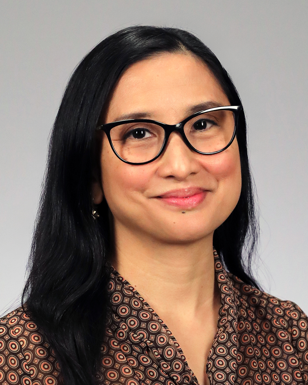Iris A. Comes, MD