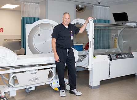 Dr. Maturo and an HBOT chamber