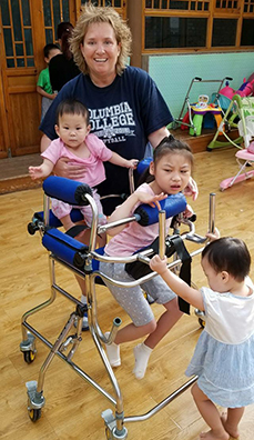 Dana with three kids Dana with three kids